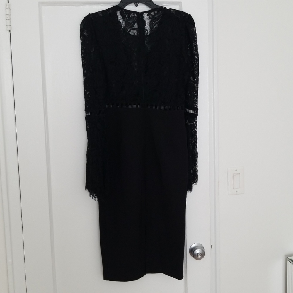 Classy Sexy black cocktail lace dress.